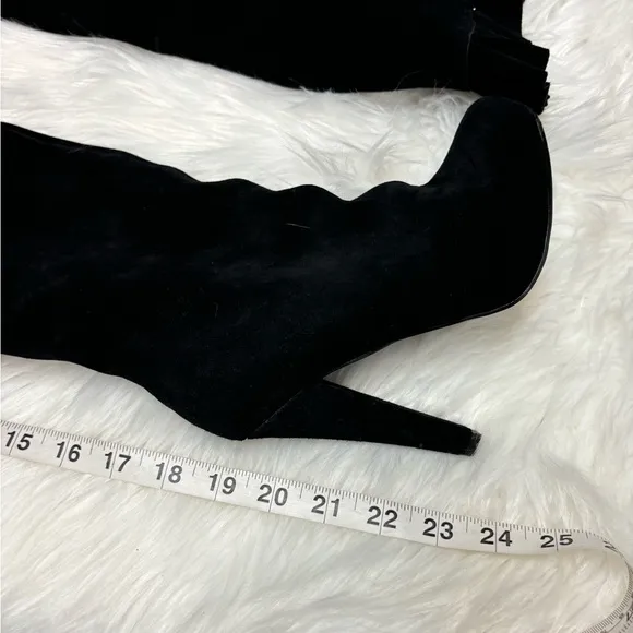 | Colin Stuart | knee high boots with ruffle. Size 6.