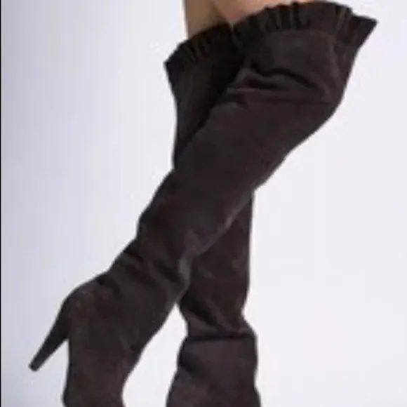 | Colin Stuart | knee high boots with ruffle. Size 6.