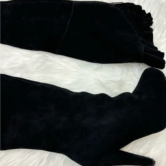 | Colin Stuart | knee high boots with ruffle. Size 6.