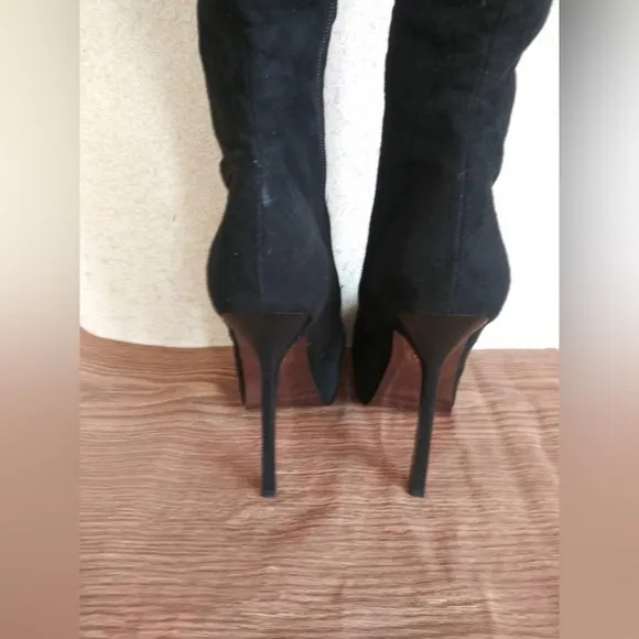 Bebe knee high/ over the knee black suede high heeled boots in size 8. New w/box