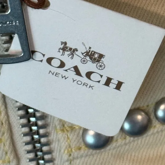 Coach cream miniskirt with silver studs