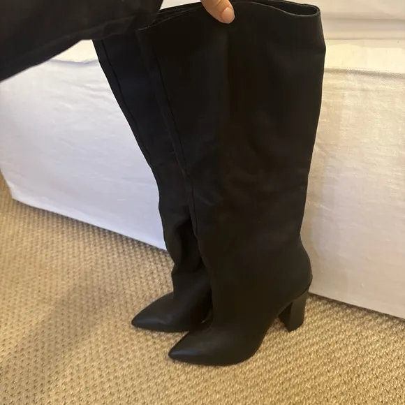 Dolce Vida leather new without box size 8.5 Black knee-high boots.$240 in stores