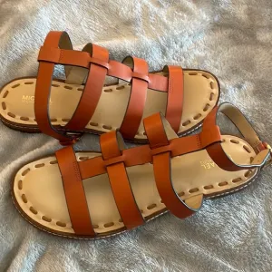 MK gladiator sandals. Burnt Orange color, size 8