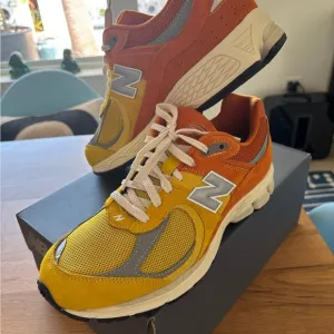 New Balance Athletic Shoes Yellow and Orange Vibrant Design
