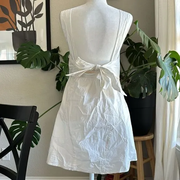 NWOT Free People Eye Catching Mini Dress Sleeveless Open Back Bow V Neck L