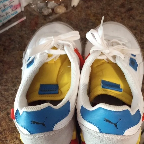 Puma White and Blue Athletic Shoes with Retro Design