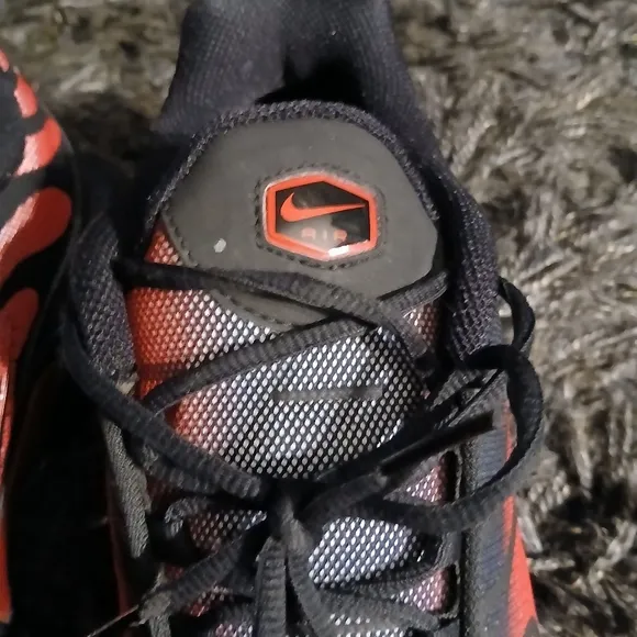 Red and Black Athletic Shoes