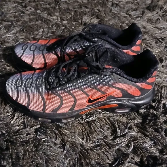 Red and Black Athletic Shoes