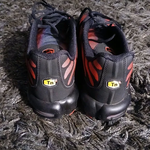 Red and Black Athletic Shoes