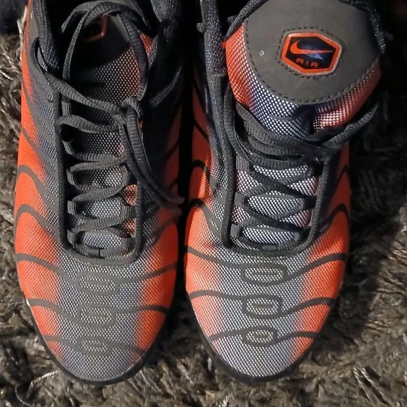 Red and Black Athletic Shoes